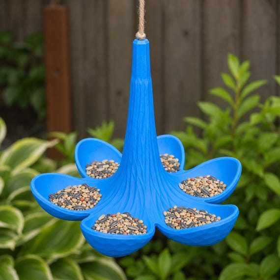 Close detail view of the Lake Blue Petalspire feeder's radial bowls and tapered spire