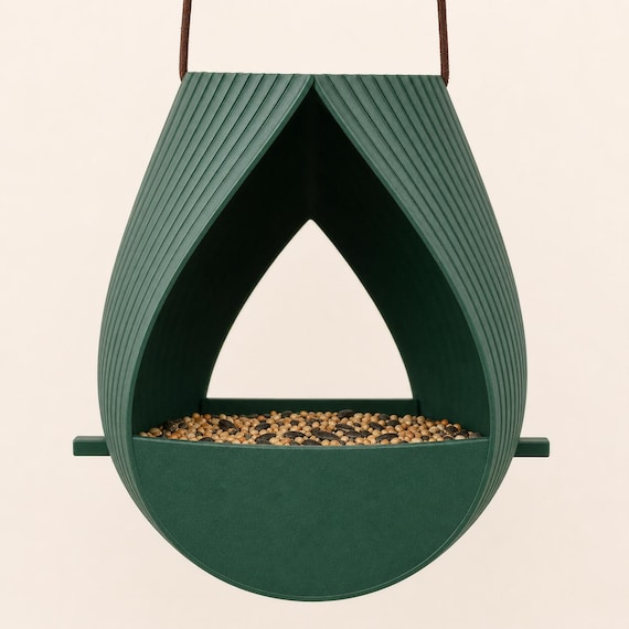 Front view of the Forest Green Ribbon Roost feeder and cross-perch