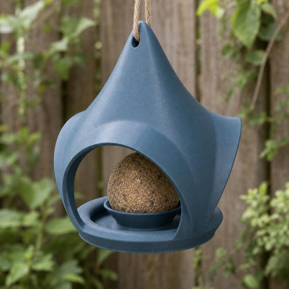 Side garden angle of the Lake Blue Crownveil hanging suet feeder
