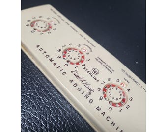 Máquina sumadora antigua Sterling Dial A Matic Calculadora matemática antigua