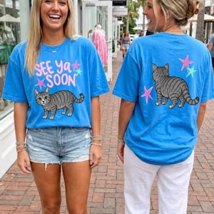 Diseño de camiseta con frase de moda "See Ya Soon Cat PNG" para descargar digitalmente.