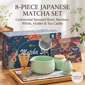 May include: An 8-piece Japanese matcha set including a light green spouted bowl, bamboo whisk, whisk holder, tea caddy with wooden lid, metal strainer, and bamboo scoop. The items are displayed on a bamboo tray with a patterned mat.