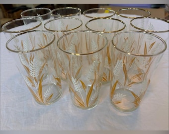 Ensemble de verrerie vintage Libbey avec un motif de blé blanc et doré. Ensemble de 11
