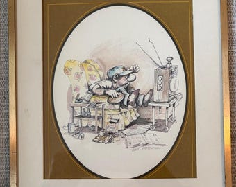 Une affiche humoristique encadrée de Gary Patterson avec un homme regardant la télévision. 1975-1976
