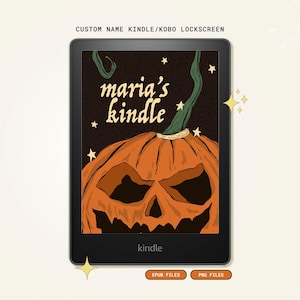 May include: A black e-reader displaying a custom lockscreen graphic featuring a large orange jack-o'-lantern with a green stem against a dark background with stars. The text "maria's kindle" is written in a cream-colored script font above the pumpkin.