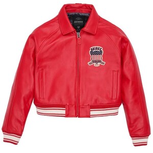 May include: A bright red leather bomber jacket featuring a classic collar, a full-length front zipper, and ribbed cuffs and hem with white stripes. A patch on the left chest displays the text AVIREX above a shield with stars and stripes.