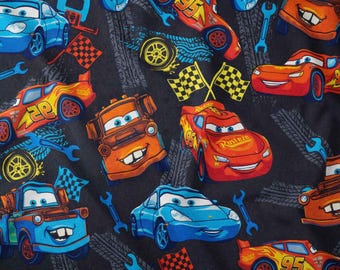 Cars Crew Tire Tracks on Dark Fabric by Yard Cotton