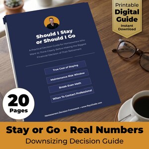 May include: A navy blue guide titled "Should I Stay or Should I Go" with the text "A Practical Decision Guide for Homeowners". The guide has 20 pages and includes topics like "True Cost of Staying". A coffee cup and glasses are on the wooden surface.