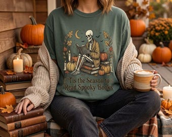 Tis the Season to Read Spooky Books Tee | Skeleton Reading Pumpkin Shirt
