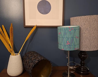 Collection : Abat-jour tambour faits main, motifs variés.
