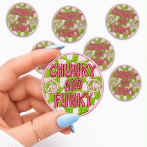 May include: Embroidered patch with the words "CHUNKY AND FUNKY" in pink, surrounded by a green and white checkered pattern and peace signs. Several patches are visible, with one held by a hand.