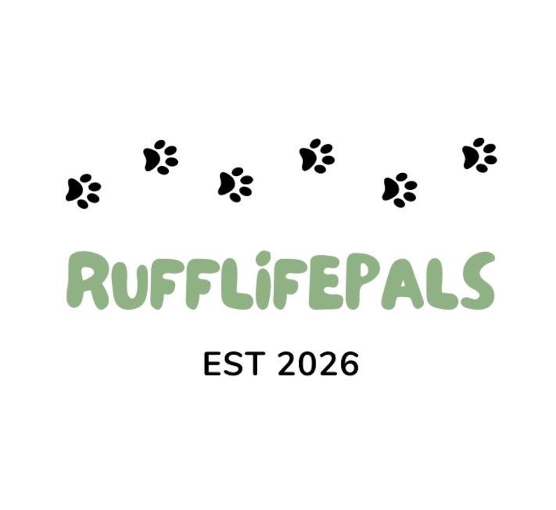 May include: A white background featuring black paw prints and the green text "RUFFLIFE PALS". Below, in black, is "EST 2026". The design is clean and suitable for pet-themed items.