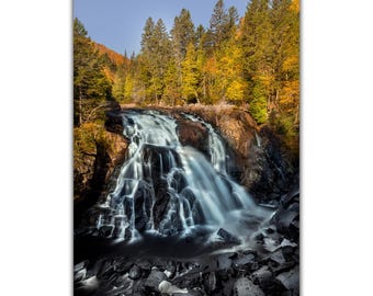 Waterfall beneath the softness of autumn