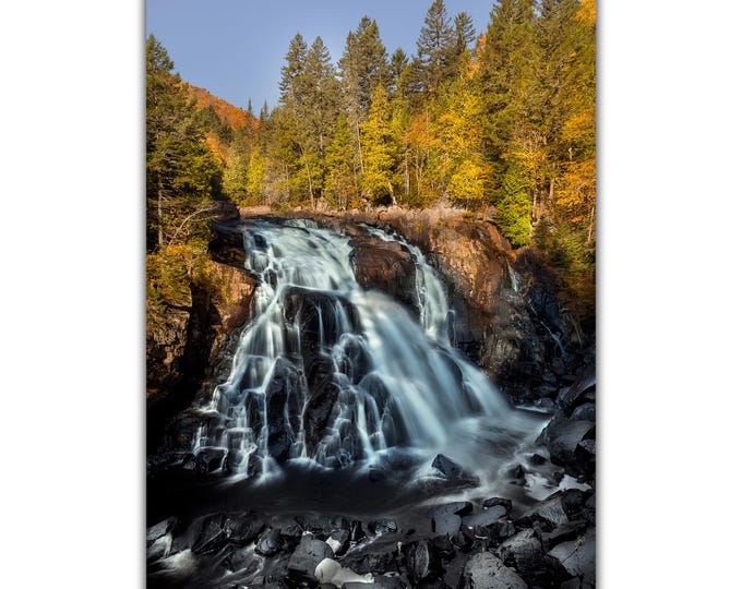 Waterfall beneath the softness of autumn