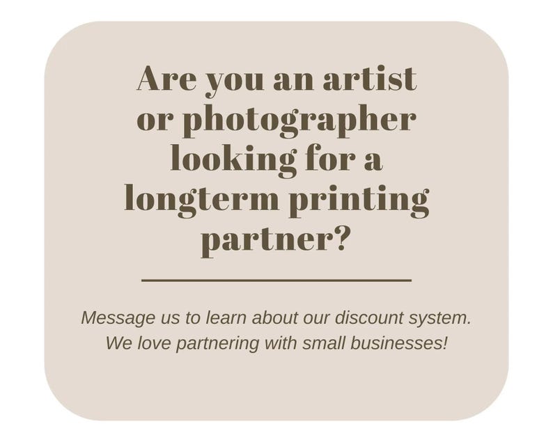 May include: A beige-colored graphic with rounded corners features text in brown. The text reads: "Are you an artist or photographer looking for a longterm printing partner?" Additional text: "Message us to learn about our discount system. We love partnering with small businesses!"