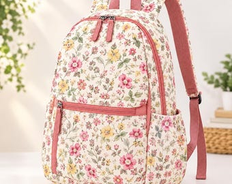 May include: A backpack featuring a cream-coloured base with a repeating floral pattern of pink and yellow flowers and green leaves. It includes a main zippered compartment, a smaller front zippered pocket, two side pockets, and pink shoulder straps.
