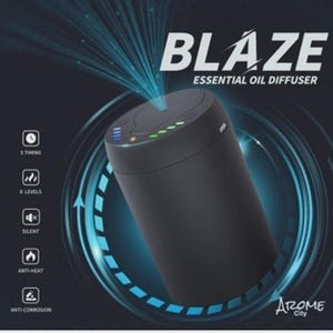 Könnte beinhalten: Schwarzer ätherischer Öl Diffusor mit dem Text "BLAZE ESSENTIAL OIL DIFFUSER". Der zylindrische Diffusor hat eine Reihe von Lichtern auf der Oberseite. Das Bild enthält auch Symbole für Timing, Level, Silent-Modus, Anti-Hitze und Anti-Korrosion.