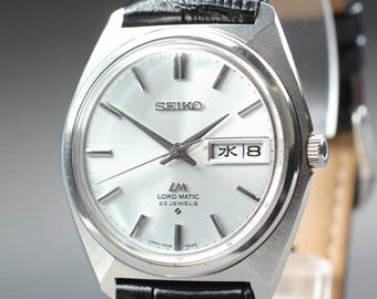 Vintage [N Mint] Seiko Lord Matic 5606-7000 Silberne Herrenuhr mit Tag- und Datumsanzeige #290
