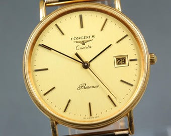 Klasyczny męski zegarek kwarcowy Longines Presence L4.636.2 z tarczą w kolorze złotym, 33 mm i datą, nr 312