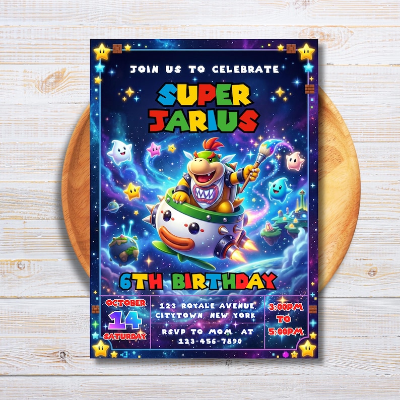 May include: A rectangular birthday invitation card featuring a space-themed background with Bowser Jr. in a clown car. The text reads JOIN US TO CELEBRATE SUPER JARIUS 6TH BIRTHDAY, OCTOBER 14 SATURDAY, 123 ROYALE AVENUE, CITYTOWN, NEW YORK, 3:00PM TO 5:00PM.