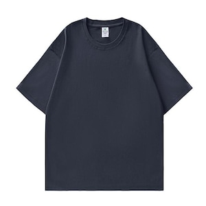 May include: A solid navy blue short-sleeve t-shirt. The shirt has a crew neck and a relaxed fit. The fabric appears to be a soft, breathable material, suitable for casual wear. The shirt is a versatile wardrobe staple.