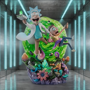 May include: A detailed figurine of Rick and Morty characters. Rick, with blue hair and a lab coat, holds a ray gun. Morty is falling through a green portal. The base features colorful flowers, mushrooms, and a purple rock formation. The background is a futuristic hallway.