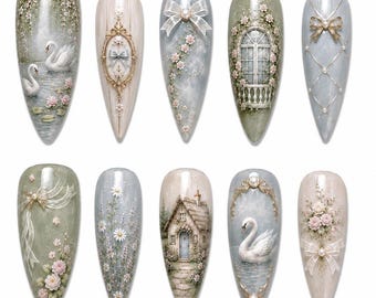 May include: Ten almond-shaped artificial nail tips featuring intricate 3D designs including white swans on water, ornate gold frames with bows, delicate floral vines, a balcony window, a stone cottage, and bouquets of pink roses with ribbons.