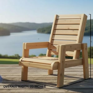 May include: A light-colored wooden chair with a slatted back and seat, featuring armrests and four sturdy legs. The chair has an overall height of 34 inches and an overall width of 23 inches as indicated by the measurement lines in the image.