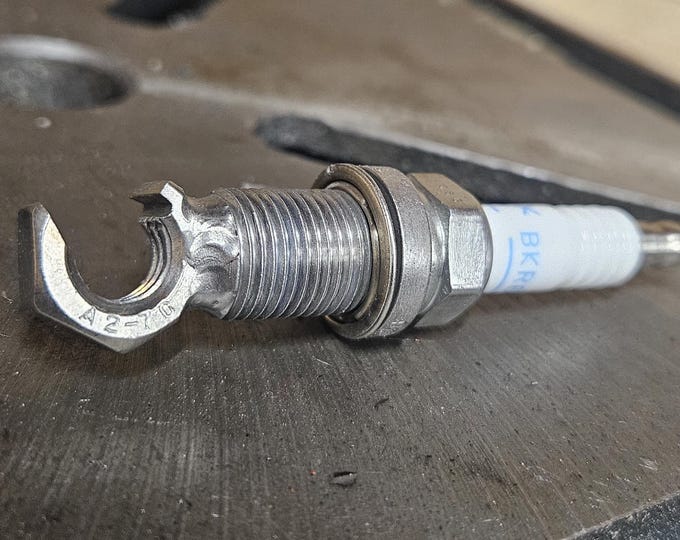 Handcrafted NGK Spark Plug Bottle Opener: Polished Metal, Industrial Style