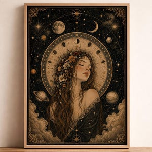 May include: A framed wall art print featuring a person with long wavy hair adorned with flowers, set against a dark celestial background. The composition includes a circular moon phase diagram, planets, stars, and clouds in gold and black tones.