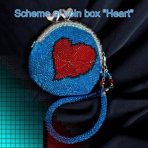 May include: A round coin purse crafted from blue beads with a prominent red heart design in the center. The purse features a silver-toned metal kiss-lock clasp with two heart-shaped knobs and a matching blue beaded wrist strap. Text reads: Scheme of coin box "Heart".