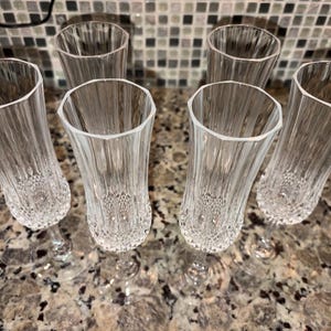 Cristal d'arques longchamp champagne glasses.