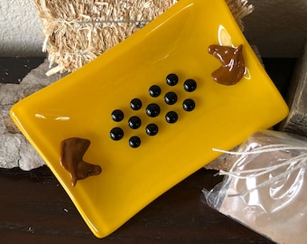 Yellow Glass Dish with brown horse head and black “Lifters” 4"x6"