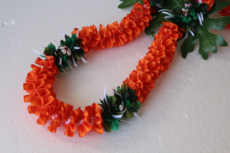 Hawaiian Ribbon Lei Plumeria Orange with Painted White Hibiscus Kukui Nut