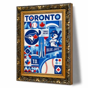 May include: A framed graphic art print featuring a collage of Toronto Blue Jays baseball imagery, including the CN Tower, the team mascot, a baseball, and maple leaves. The text reads TORONTO, TORONTO BLUE JAYS, BLUE JAYS, and T.O. in blue and white.