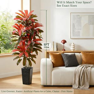 Op de afbeelding: Een kunstplant met rode en groene bladeren, in een zwarte vierkante plantenbak. De plant is 150 cm hoog. De afbeelding bevat tekst: "Will It Match Your Space? See Exact Sizes" en "Live Greener, Easier: Artificial Plants for a Calm, Clutter - Free Home."