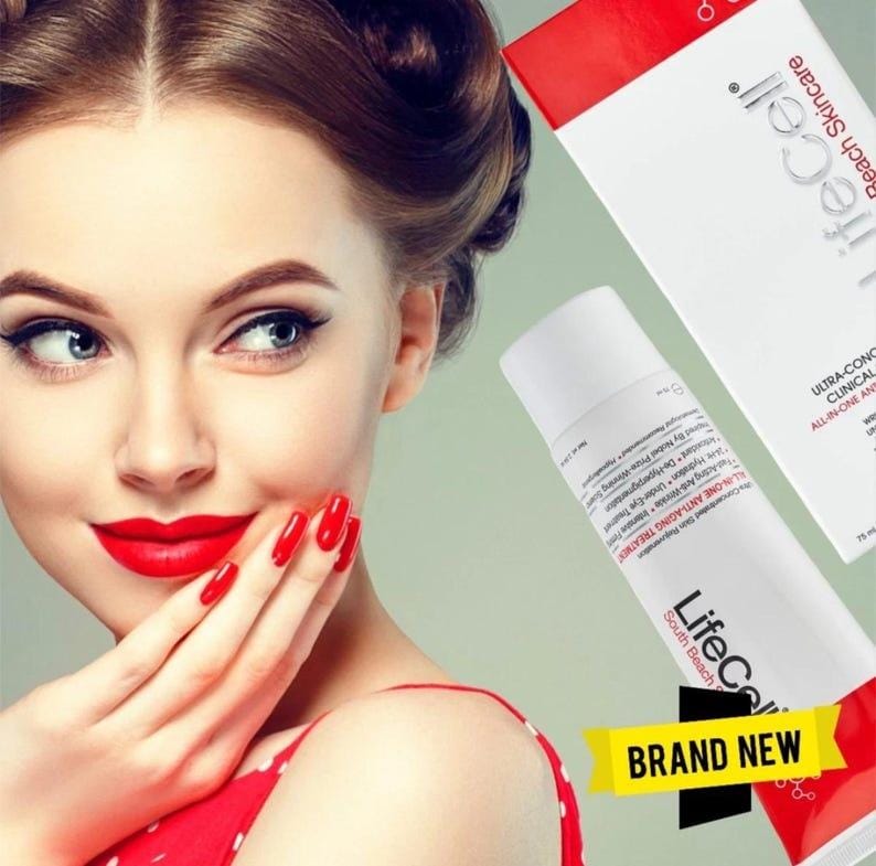 May include: A woman with red lipstick and nails holds her hand near her face. A white tube and a red and white box of LifeCell skincare products are in the background. The tube reads "ALL-IN-ONE ANTI-AGING TREATMENT". A yellow banner says "BRAND NEW".