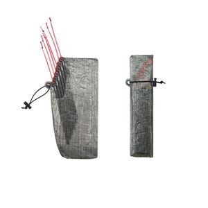 May include: A gray, crinkled, rectangular storage pouch containing several black, flat, rectangular stakes with thin red pull cords attached. A second, identical pouch is shown closed and secured with a black cord and toggle fastener.