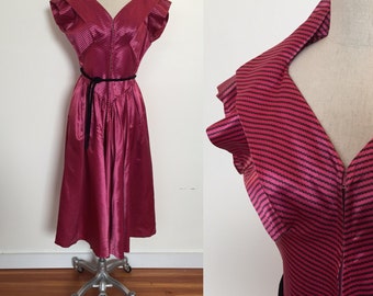 1950s pink and black acetate dress with stand up collar