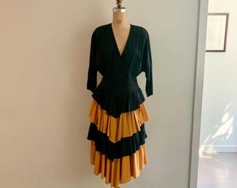 Electric Blue label 70s-80s tiered black and gold rayon dress-size M (marked 10)