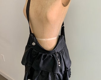 Erda-oversize deerskin black leather wearable art abstract ruffle shoulder bag.