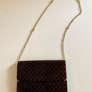 Ferragamo brown suede logo envelope bag with gold shoulder strap. image 4