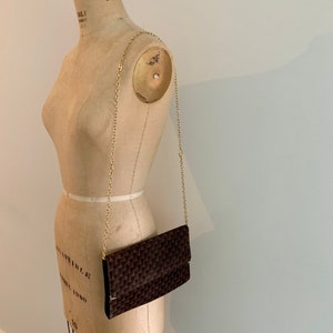 Ferragamo brown suede logo envelope bag with gold shoulder strap. image 2