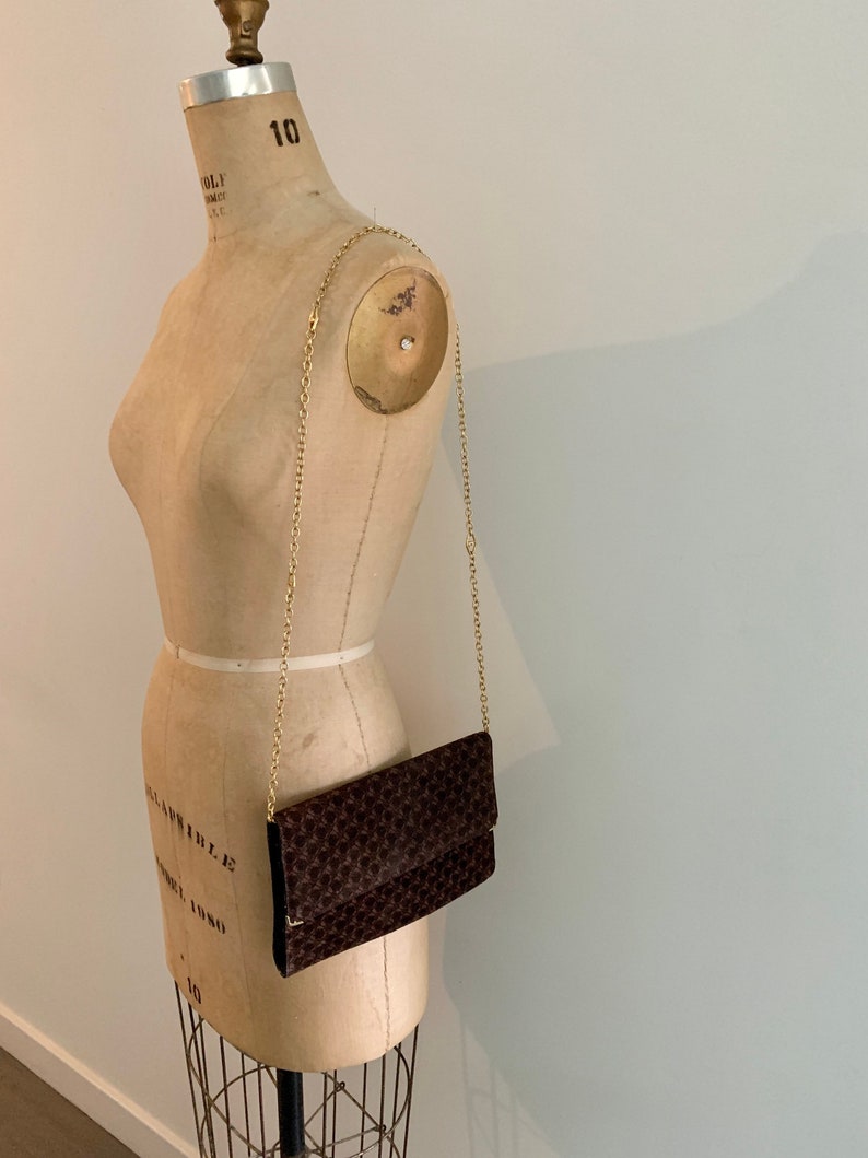 Ferragamo brown suede logo envelope bag with gold shoulder strap. image 2