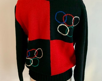 Collectible vintage winter Olympic Rings color block wool sweater. Size Men’s S/M