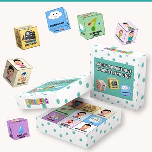 May include: A set of white boxes with teal polka dots containing storytelling dice. The dice feature illustrations and words like "Pirate Ship," "Pouring Rain," and "Waving." The text "WACKY ADVENTURES STORYTELLING DICE" is on the box.
