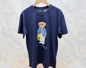 Camiseta de algodón para hombre con estampado gráfico de oso, manga corta, estilo casual y urbano, ideal para el verano.