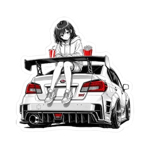 May include: White car sticker featuring an anime-style illustration of a person sitting on the spoiler of a white sports car. The car has a large rear wing, red taillights, and a black rear diffuser. A red cup and a container of fries are visible.