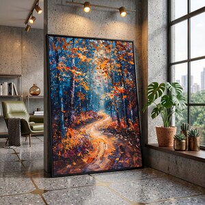Könnte beinhalten: Gerahmtes Landschaftsgemälde mit einem gewundenen Pfad durch einen Wald. Das Kunstwerk verwendet Blau-, Orange- und Brauntöne, wobei der Fokus auf den Bäumen und dem Weg liegt. Das Gemälde wird in einem modernen Innenraum ausgestellt.
