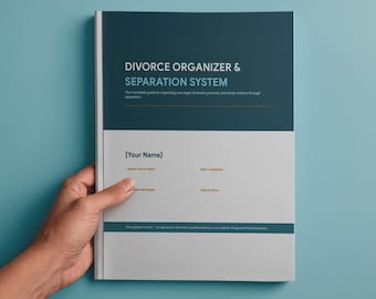 May include: A teal and white book titled "Divorce Organizer & Separation System" is held against a teal background. The book's cover includes space for the user's name and other details. The text on the cover is in a sans-serif font.